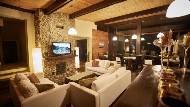 Lounge with fireplace, evening
